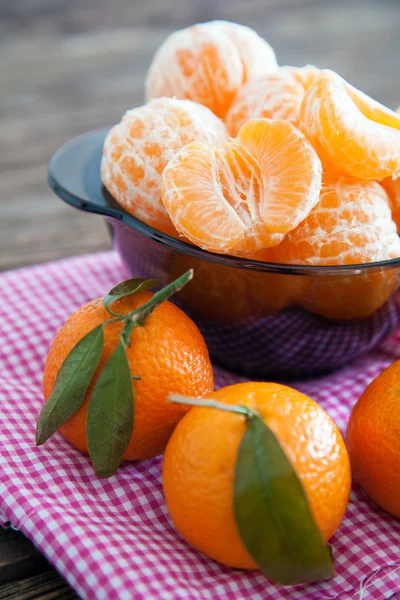 Peeled tangerines on a table — Stock Photo, Image