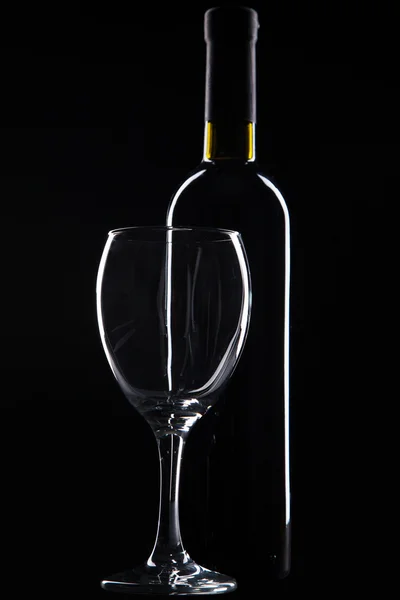 Wine glass and bottle — Stock Photo, Image