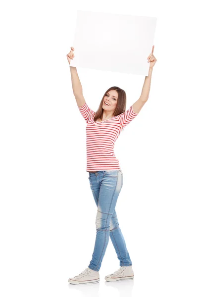 Casual young woman holding a white board — Stock Photo, Image