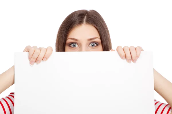 Casual young woman holding a white board — Stock Photo, Image