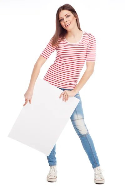 Casual young woman holding a white board — Stock Photo, Image