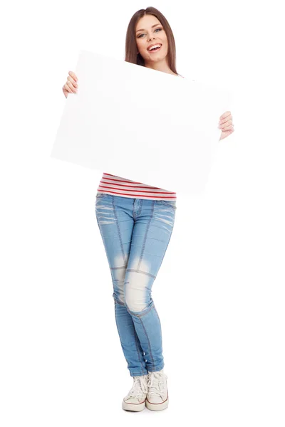 Dorywczo młoda kobieta trzymając deskę biały — Zdjęcie stockowe