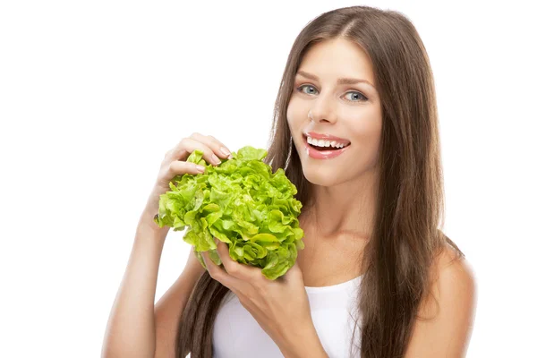 Jovem mulher comendo salada verde — Fotografia de Stock