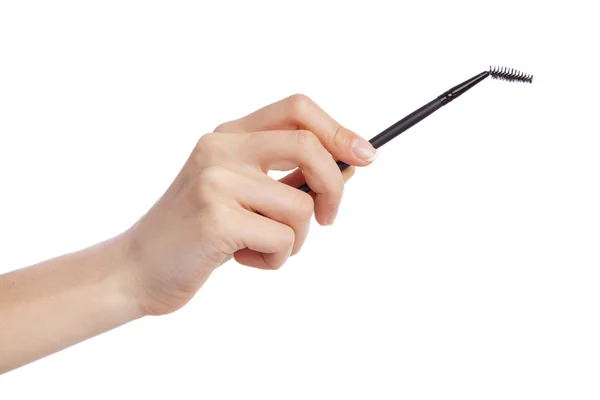 Female hand holding a makeup brush — Stock Photo, Image