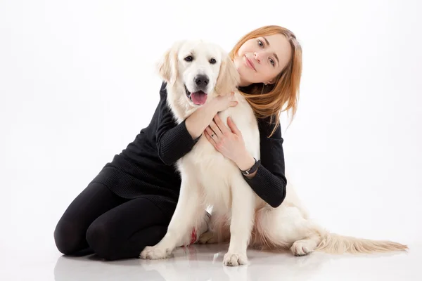 Beautiful young woman with a dog — Stock Photo, Image