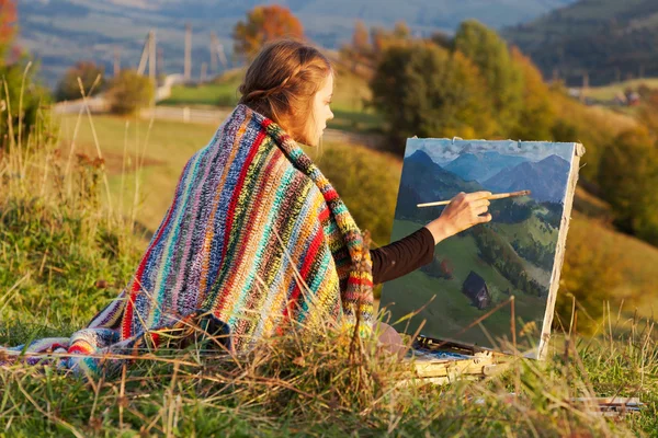 Joven artista pintando un paisaje otoñal —  Fotos de Stock