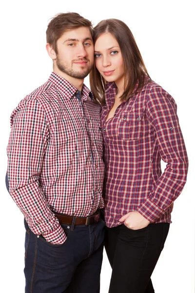 Junges Paar auf weißem Hintergrund — Stockfoto