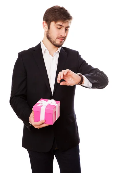 Handsome young man with a gift box — Stock Photo, Image