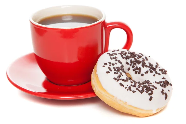 Смачний пончик з чашкою кави — стокове фото