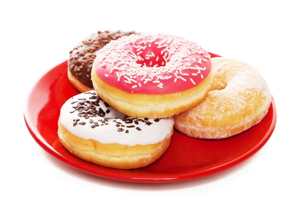 Donut saboroso com uma xícara de café — Fotografia de Stock