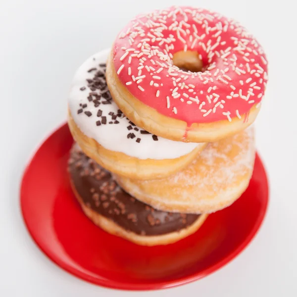 Tasty donuts on white background — Stock Photo, Image
