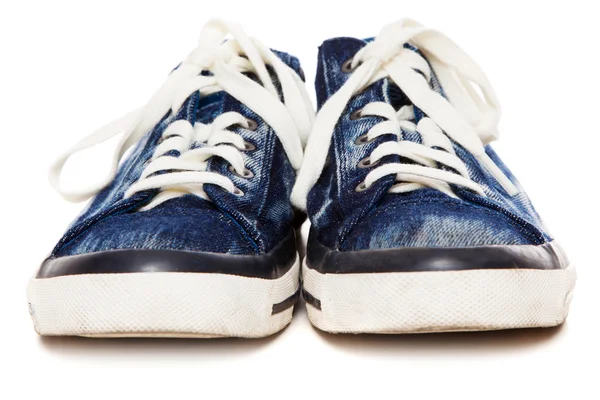 Синие кроссовки на белом фоне — стоковое фото