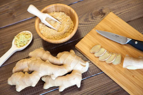 Cut, grated and ground ginger — Stock Photo, Image