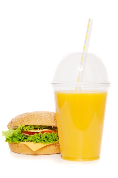 Гамбургер и апельсиновый сок — стоковое фото