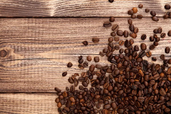 Grãos de café torrados em uma tigela — Fotografia de Stock