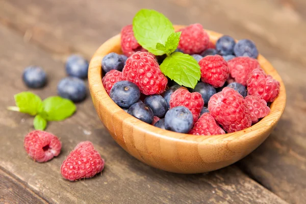 Fresh berries on a wooden table — Stock Photo, Image