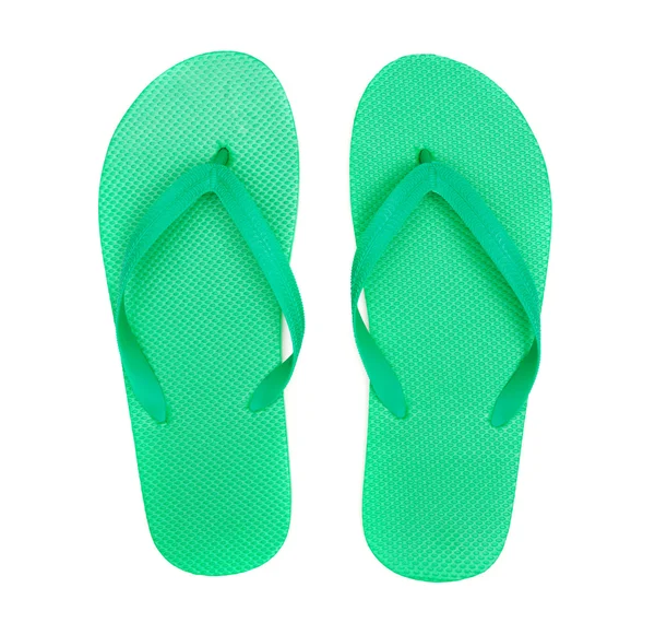 Groene slippers geïsoleerd op witte achtergrond — Stockfoto