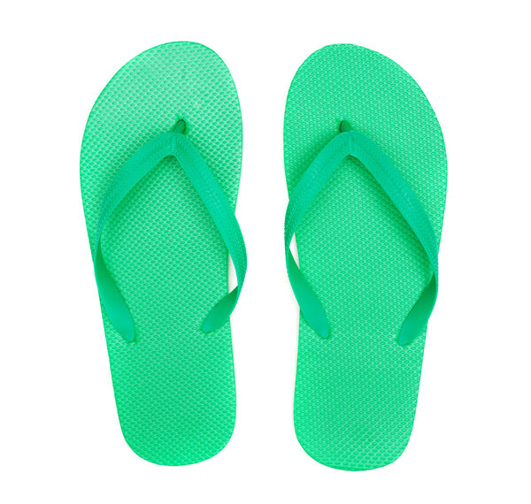 Green flip-flops isolated on white background