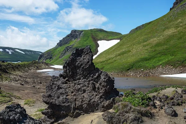 용암지대는 남쪽으로 러시아 캄차카 지역에 성층화 있습니다 유친스 Vilyuchinsk 30Km 로열티 프리 스톡 사진