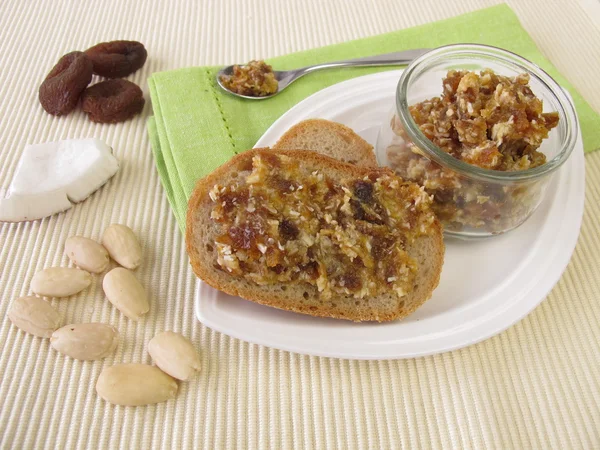 Bread spread with dried fruits — Stock Photo, Image