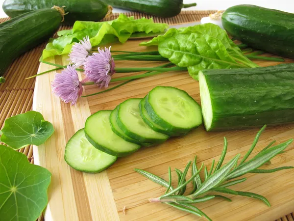 Preparation of cucumber salad with herbs — Stock Photo, Image