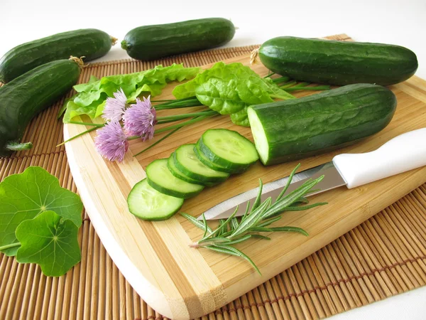 Preparation of cucumber salad with herbs — Stock Photo, Image