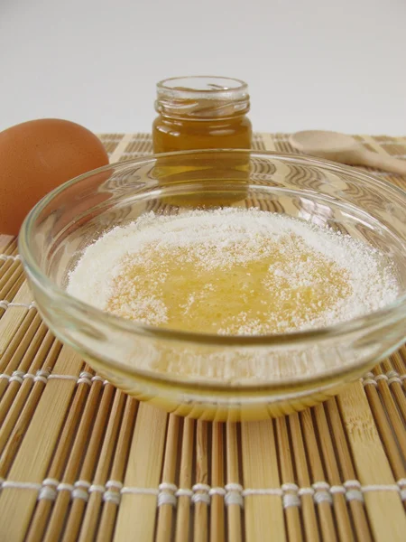 Face mask with honey, egg yolk and powdered milk — Stock Photo, Image