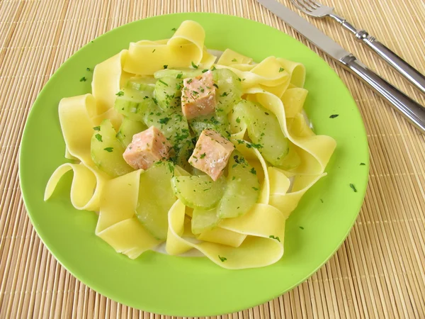 Pasta with cucumber and salmon — Stock Photo, Image