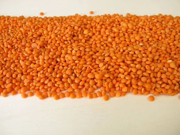 Red Lentils Distributed Flatly Wooden Board — Stock Photo, Image