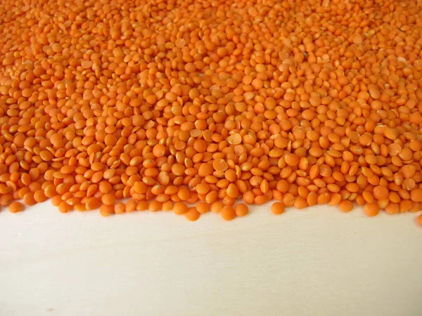 Red Lentils Distributed Flatly Wooden Board — Stock Photo, Image