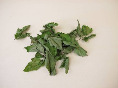 Dried outweed on a wooden board