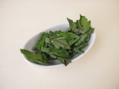 Dried outweed on a wooden board