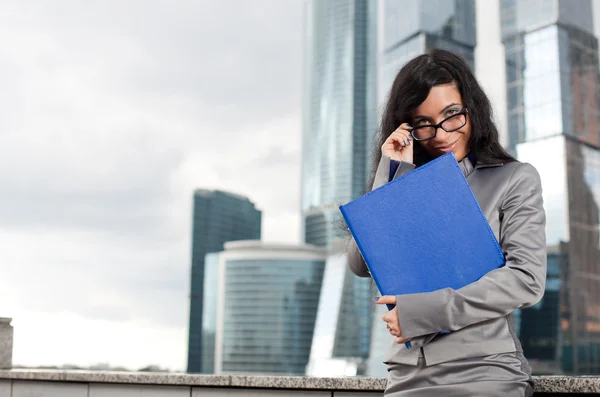 The business woman corrects spectacles — Stock Photo, Image
