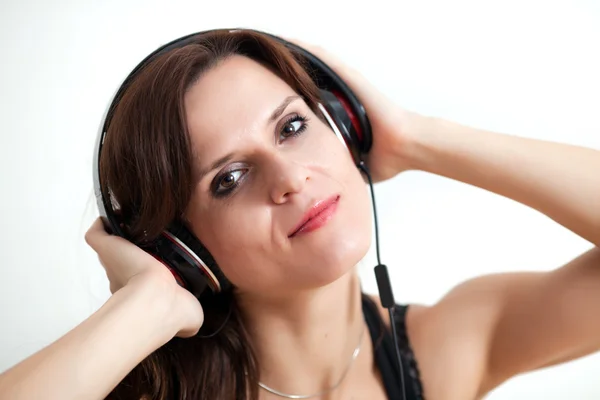 The young woman in ear-phones — Stock Photo, Image