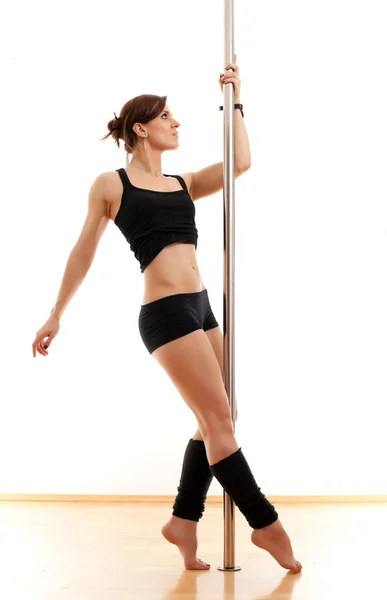 The beautiful young woman and pole — Stock Photo, Image