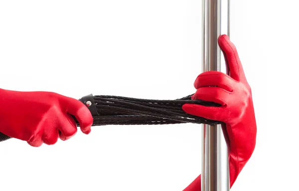 Rote Handschuhe, Peitsche und Stock — Stockfoto