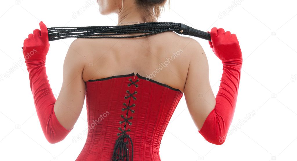 woman in a red corset and whip