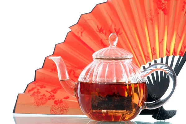 Teapot and a fan — Stock Photo, Image