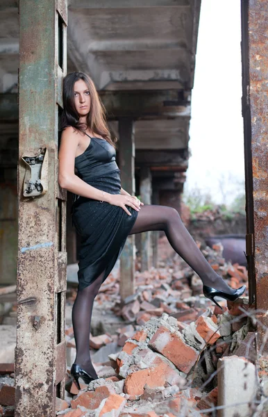 Woman in an abandoned factory — Stock Photo, Image