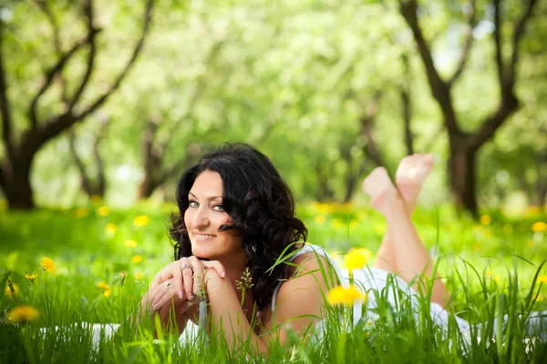 Woman on the grass Royalty Free Stock Images
