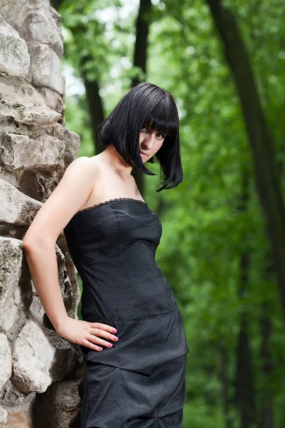 Woman in a black dress — Stock Photo, Image