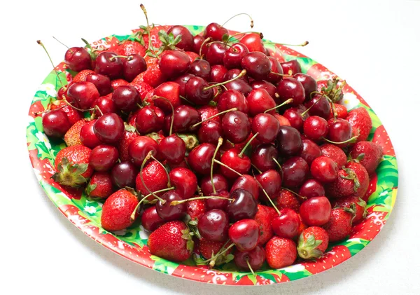 Cherry and strawberry in a plate — Stock Photo, Image