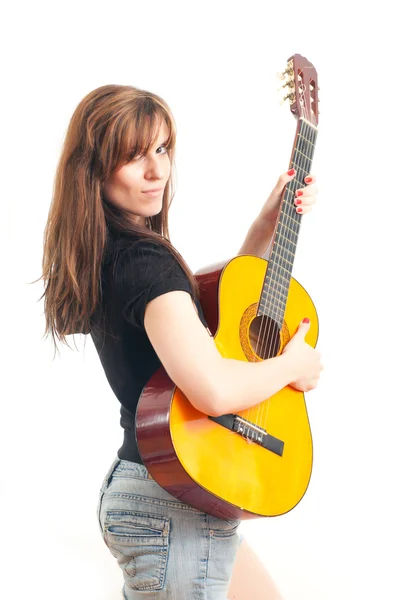 Mulher segurando uma guitarra — Fotografia de Stock