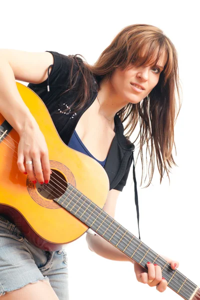 Mulher segurando uma guitarra — Fotografia de Stock