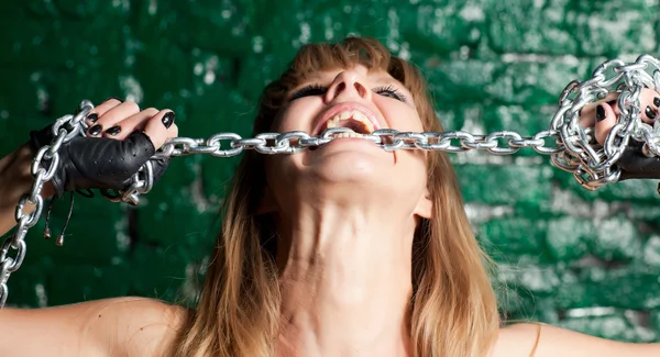 Woman with iron chain — Stock Photo, Image