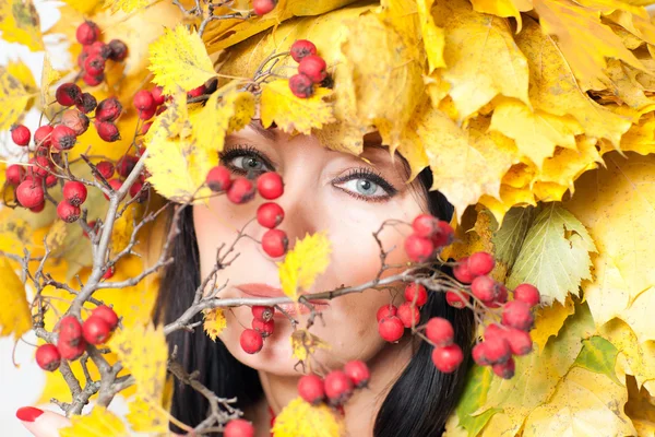 Woman's face and autumn leaves — Stock Photo, Image