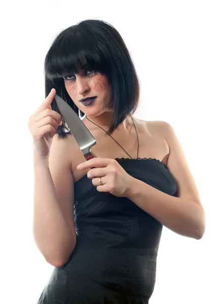 Frau hält Messer in der Hand — Stockfoto