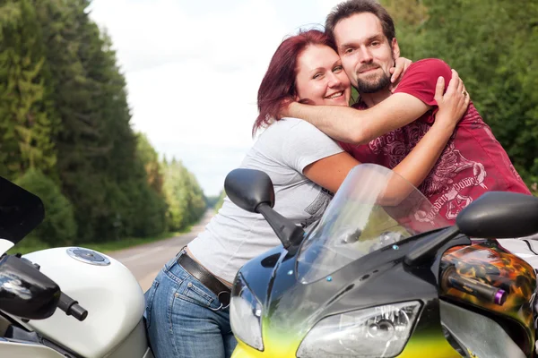 Man and woman on motorcycles — Stock Photo, Image