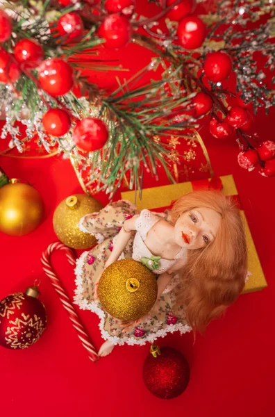 Beautiful Doll Girl Christmas Ball Her Hands Sits Branch Christmas — Stock Photo, Image