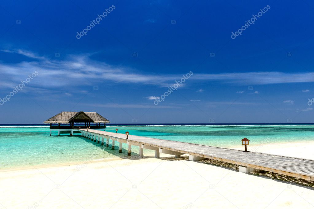 footbridge over turquoise indian ocean